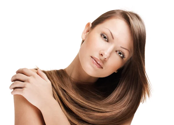 Close-up portrait of a beautiful young woman with elegant long shiny hair, isolated on white background Stock Picture