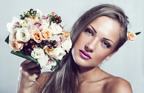 Beautiful woman with flowers, makeup — Stock Photo, Image