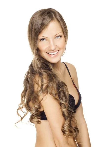 Schöne Frau mit lockigem Haar — Stockfoto