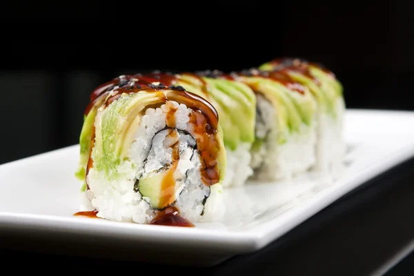 Japanese sushi roll on black background — Stock Photo, Image