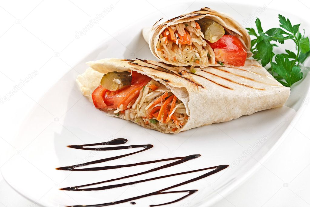Image of a doner kebab on a white plate