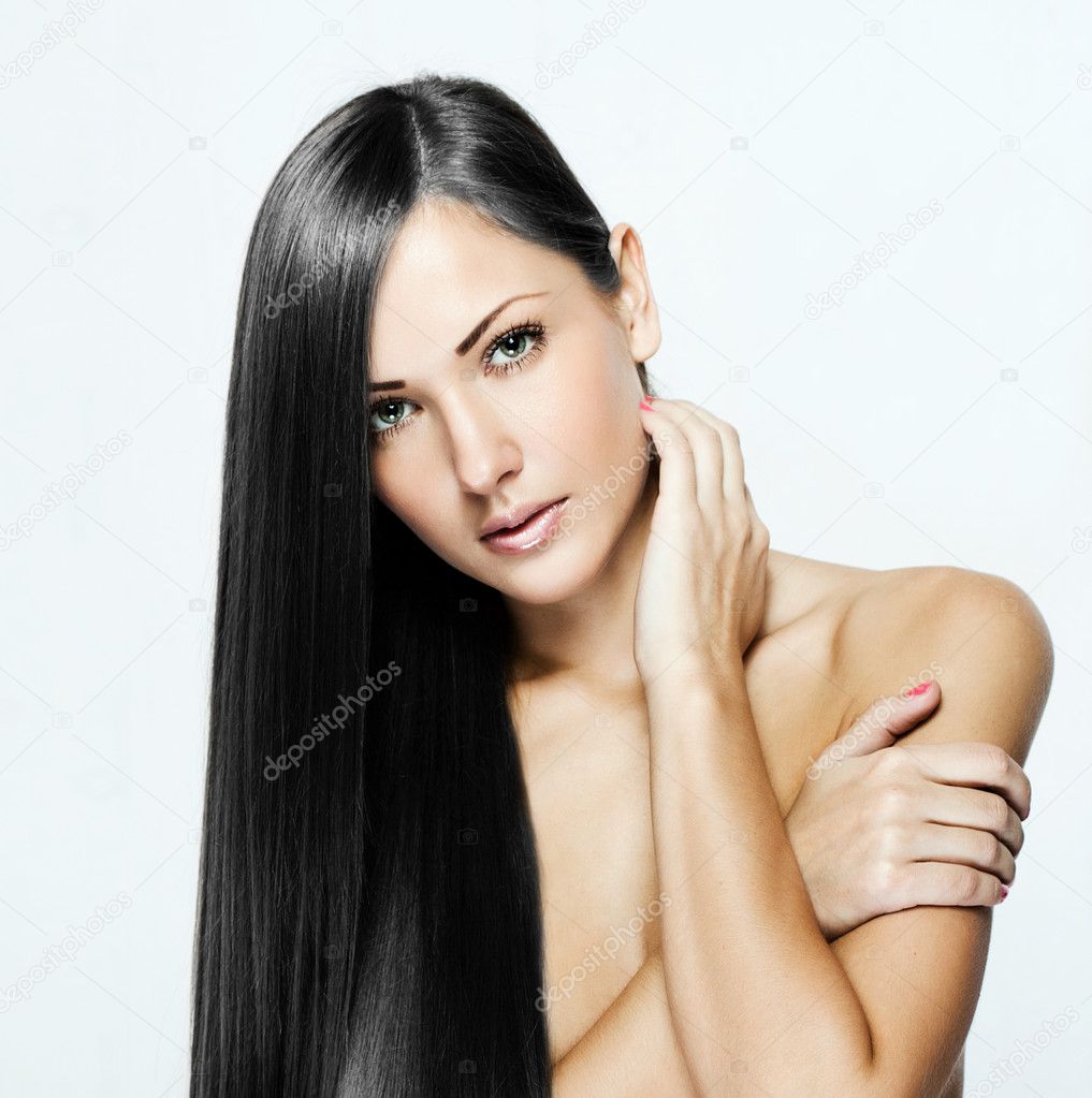 Beautiful woman with long dark shiny hair