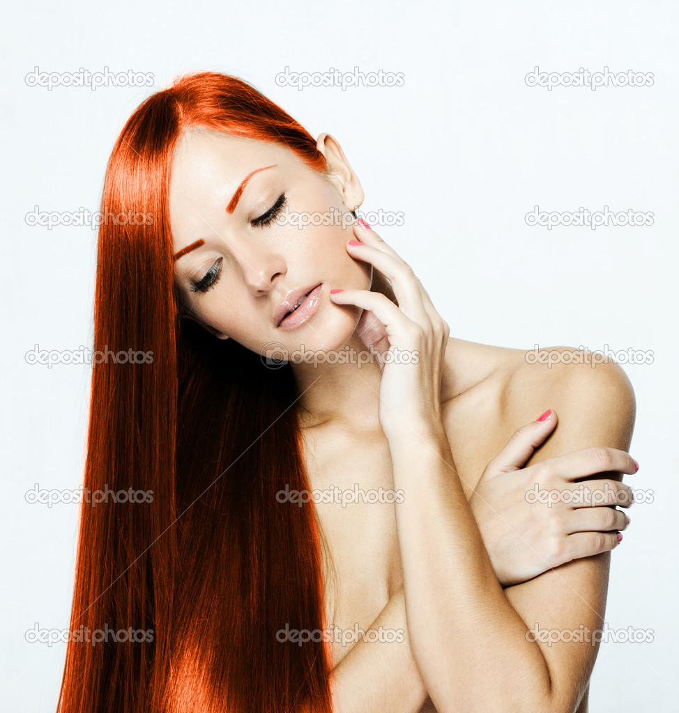 Beautiful woman with long red hair