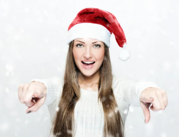 Beautiful smiling woman in Santa hat — Stock Photo, Image