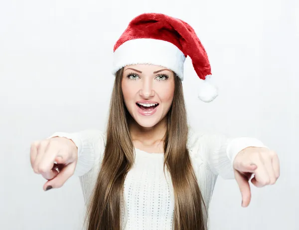Beautiful smiling woman in Santa hat — Stock Photo, Image
