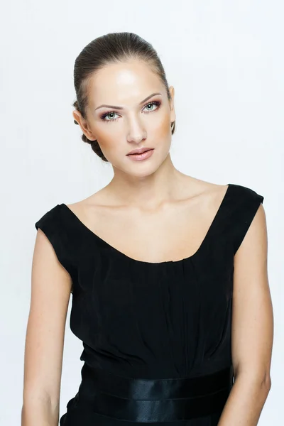 Portrait of a beautiful woman in black dress — Stock Photo, Image