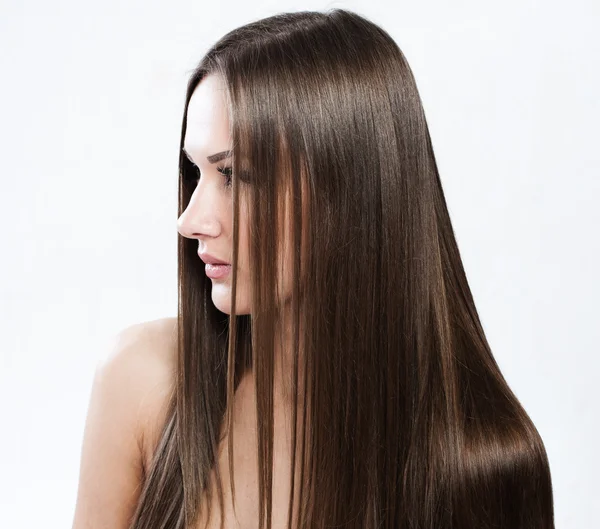 Hermosa mujer con cabello largo saludable — Foto de Stock