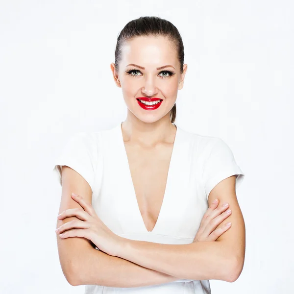 Pretty lady standing with crossed arms — Stock Photo, Image