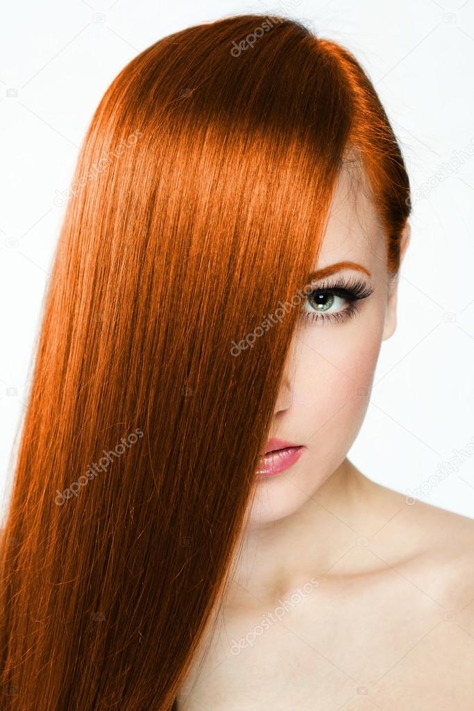 Beautiful young red-headed woman