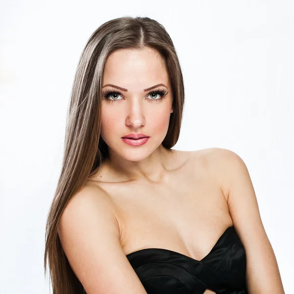 A beautiful woman in a black dress — Stock Photo, Image