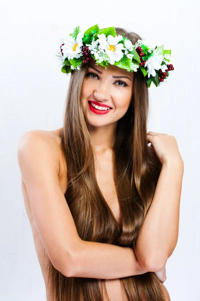 Fashion model with hairstyle and flowers in her hair — Stock Photo, Image