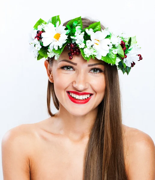 Fashion model with hairstyle and flowers in her hair — Stock Photo, Image