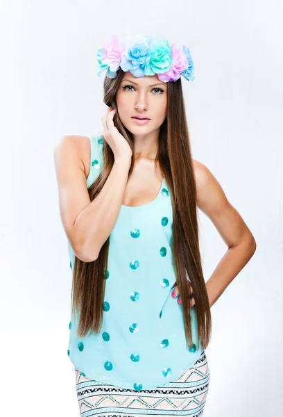 Fashion model with hairstyle and flowers in her hair — Stock Photo, Image