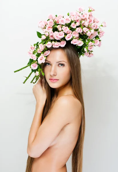 Closeup portrait of a beautiful woman with a wreath on head — Stock Photo, Image