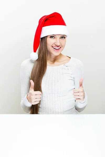 Navidad Santa sombrero mujer retrato - Sonriente chica feliz —  Fotos de Stock