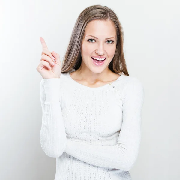 Woman pointing at empty space — Stock Photo, Image