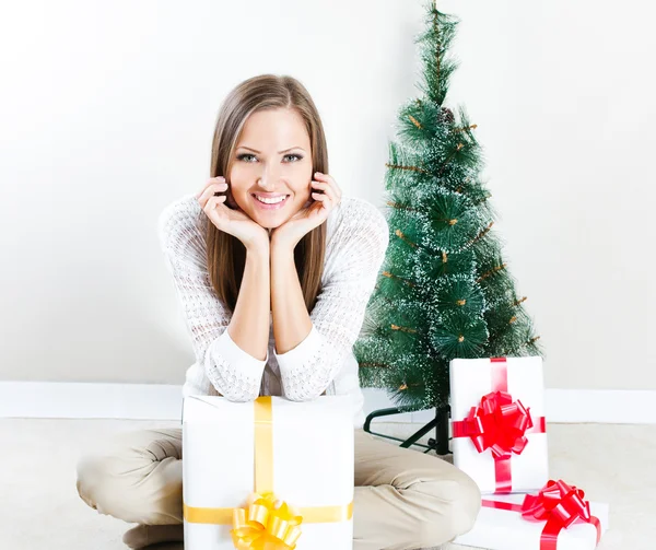 Woman with christmas gifts — Stock Photo, Image