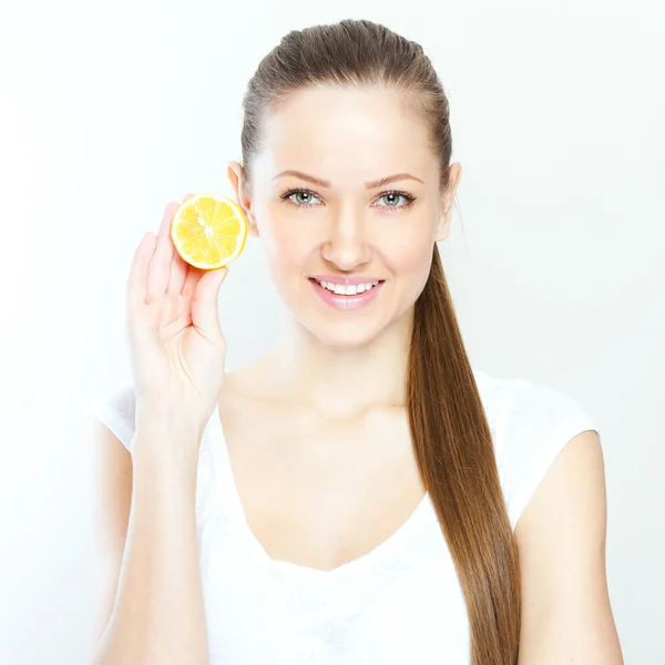 Portrait of young happy smiling woman with lemon — Stock Photo, Image