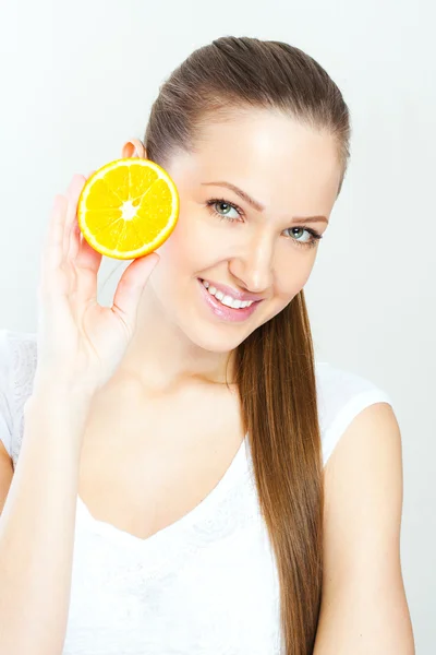 Young  woman with orange fruit — Stock Photo, Image