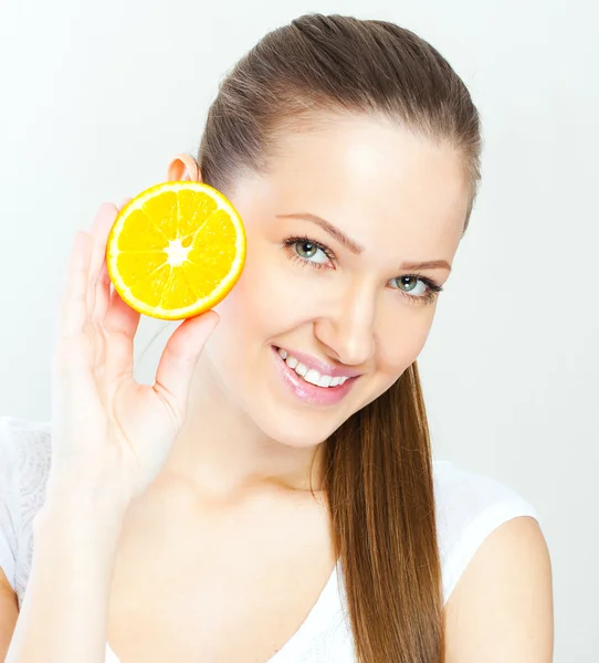 Young  woman with orange fruit — Stock Photo, Image