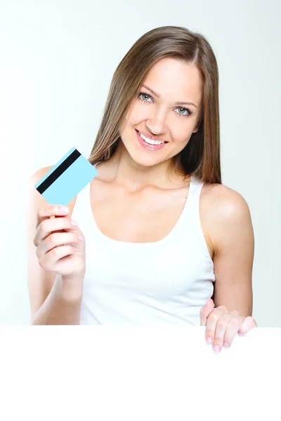 Woman holding credit card — Stock Photo, Image