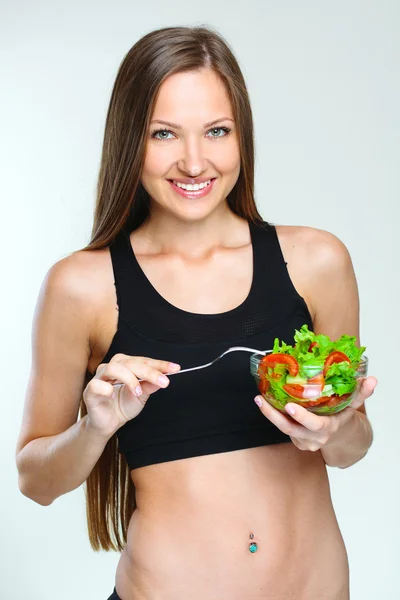 Vrouw eten fruit salade Rechtenvrije Stockfoto's