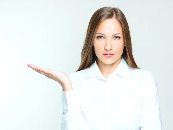 Business woman with open palm — Stock Photo, Image