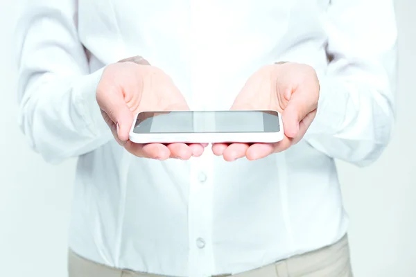 Hands holding mobile phone — Stock Photo, Image