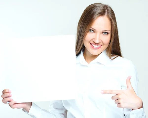 Business woman holding blank poster — Stock Photo, Image