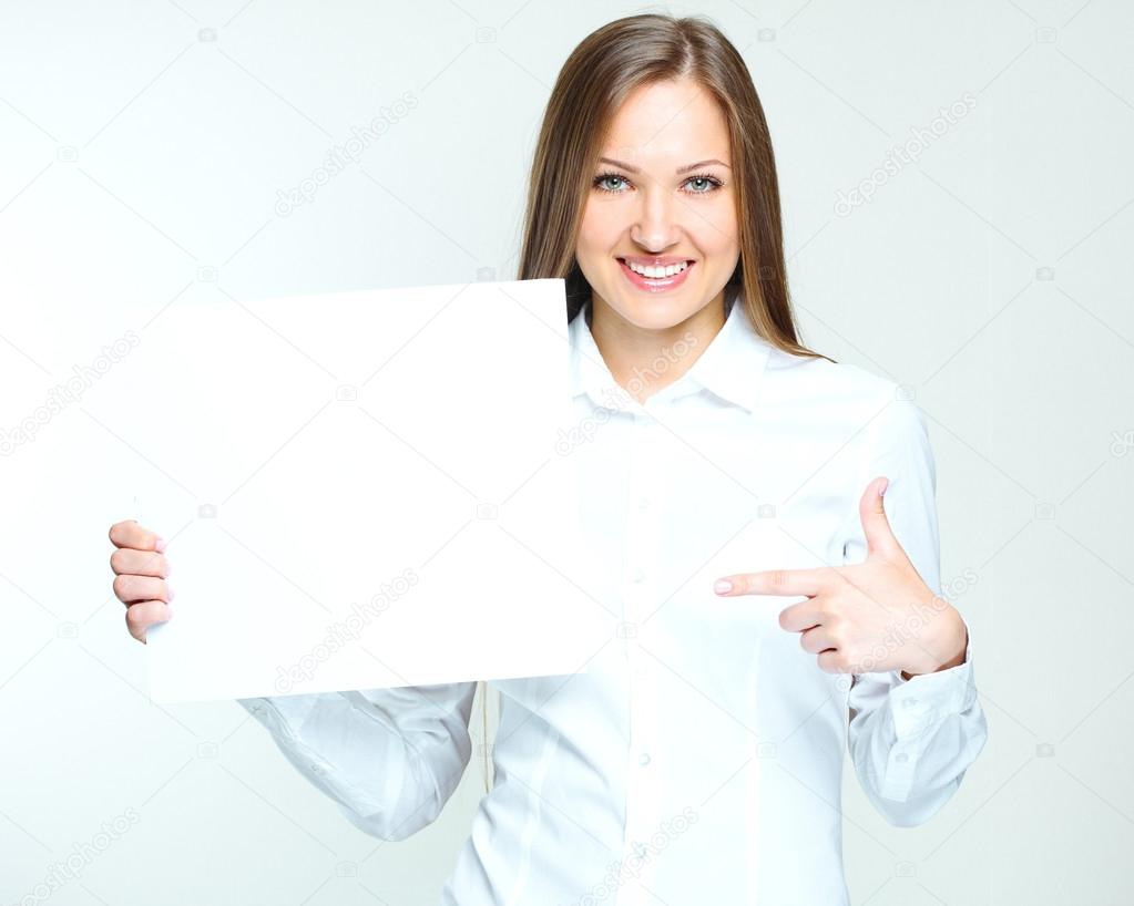 Business woman holding blank poster