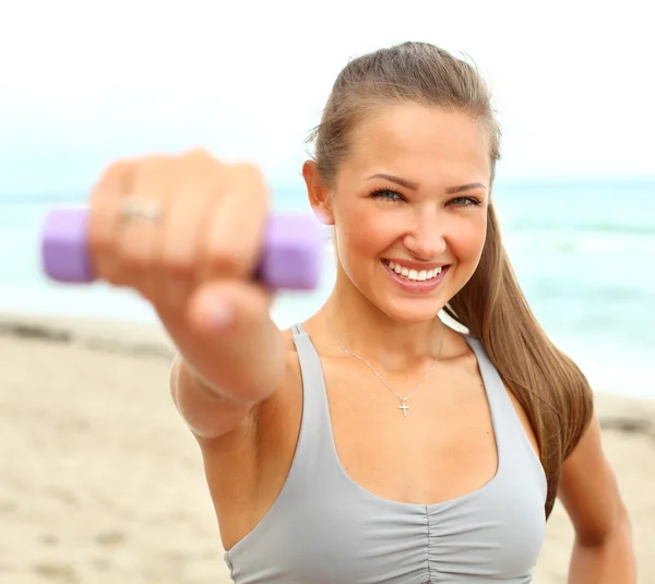 Fitness instructor making exercise — Stock Photo, Image