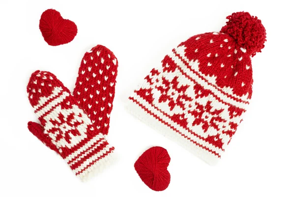 Winter cap and mittens knitted with jackard and heart motifs. on white — Stock Photo, Image