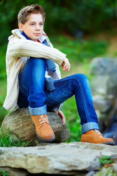 Portrait of teenage boy, colorful outdoors — Stock Photo, Image