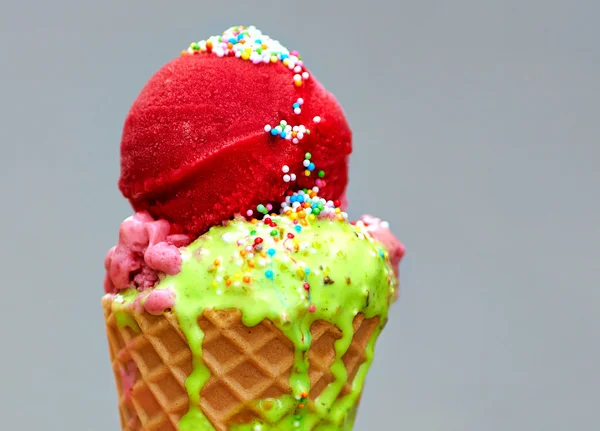 Tasty colorful melting ice cream — Stock Photo, Image