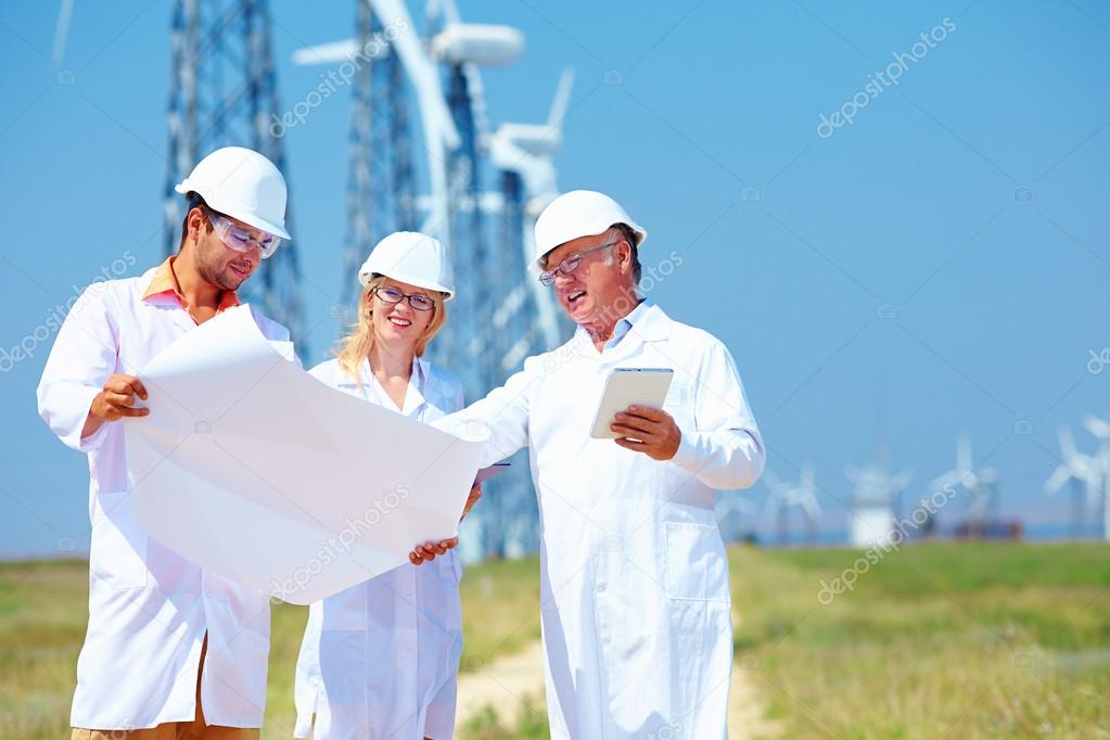 scientists discussing project on wind power station