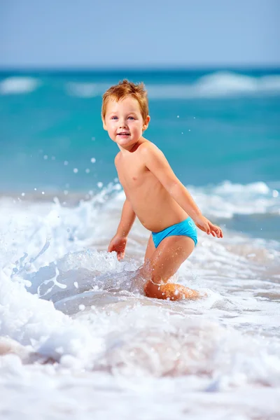 Cute kid boy having fun in sea surf, crimea — Stock Photo, Image