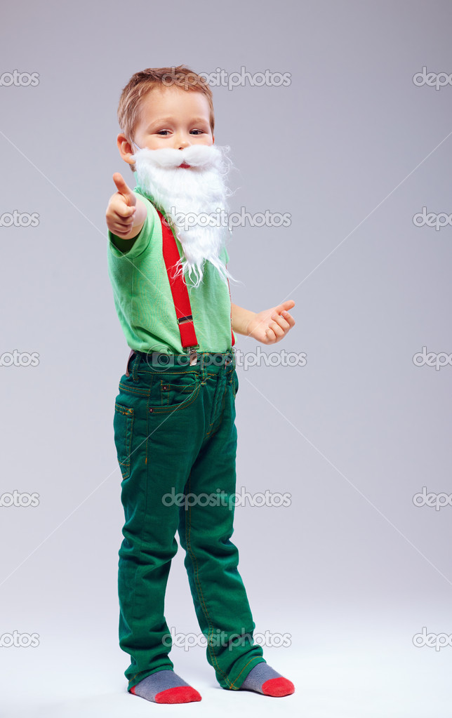 funny kid santa claus with thumb up finger