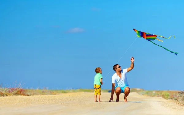 Cute kid playing with kite — Stock Photo, Image