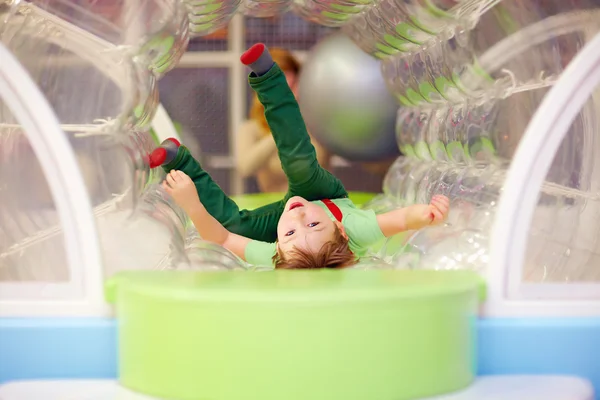 Excited kid having fun on playground — Stock Photo, Image