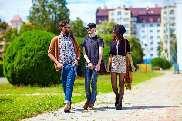 Student friends walking the street — Stock Photo, Image