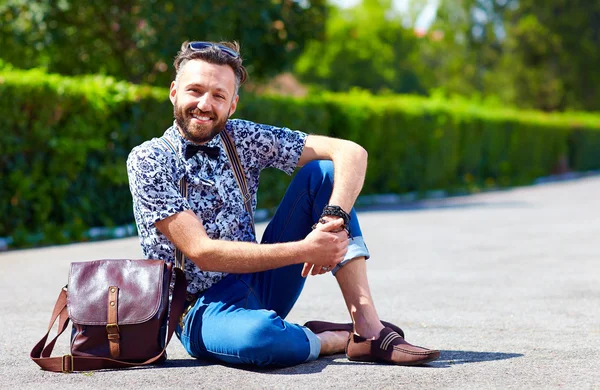 Cheerful young adult man posing on the road — Stock Photo, Image