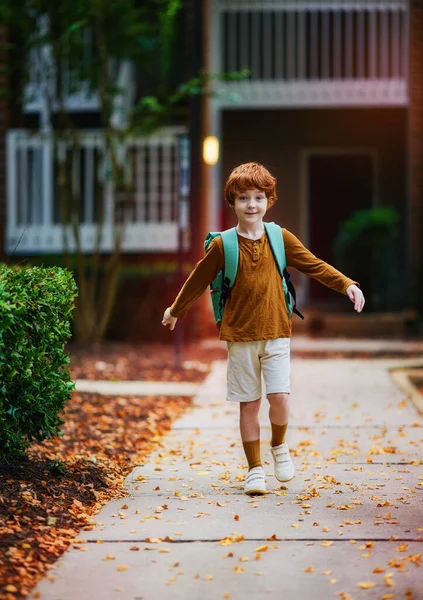 Smiling Redhead School Boy Kid Backpack Walks Neighbourhood Street His Fotografias De Stock Royalty-Free