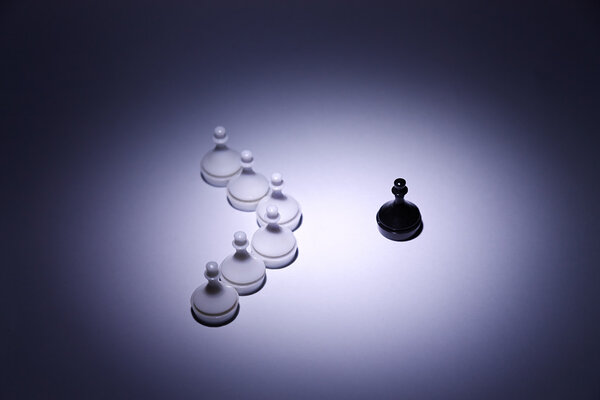 One black pawn against many white pawns