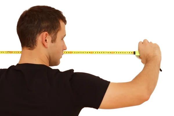 Young engineer with measure tape — Stock Photo, Image