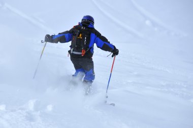 Deep powder skiing clipart