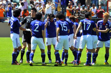 Ivory coast and Japan football match clipart