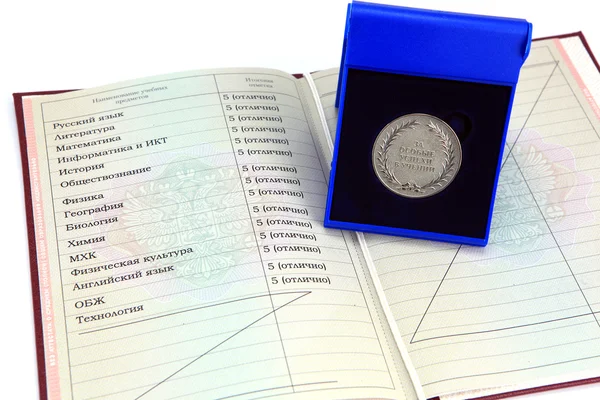 Silver medal "for outstanding achievements in teaching" in a box with a red certificate — Stock Photo, Image