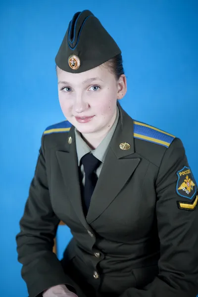 Girl student sitting on a chair — Stock Photo, Image