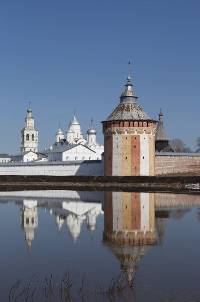 Reflection Prilutsk Saviour Monastery in Vologda river, Russia
