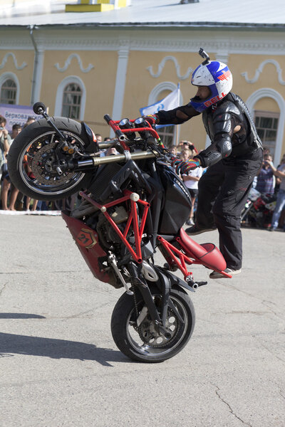 Stunts on a motorcycle by Alexei Kalinin
